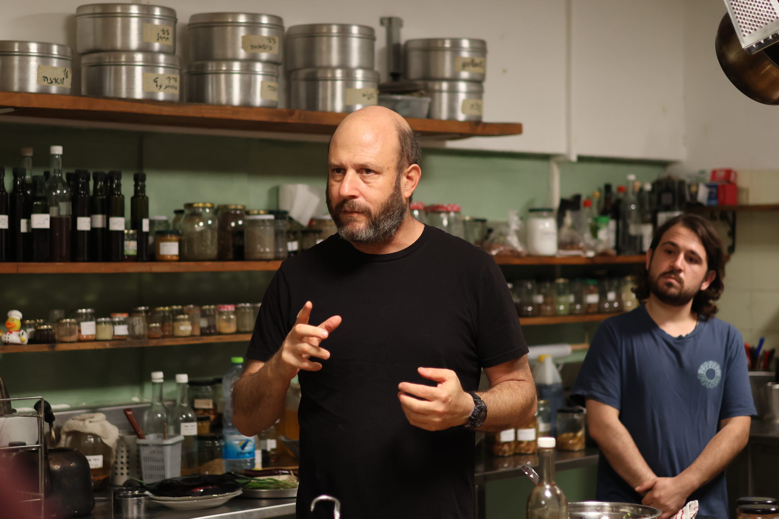 Uri Mayer Chissick leading a workshop in the kitchen